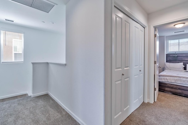 915 Winchell Way W, Madera, CA 93636 - corridor with carpet and attic access