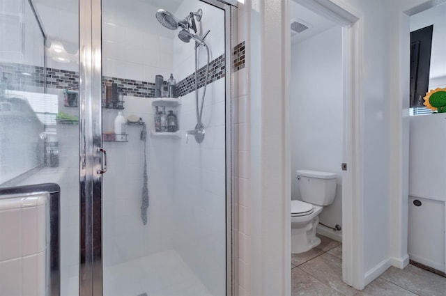 915 Winchell Way W, Madera, CA 93636 - bathroom featuring a stall shower and tile patterned flooring
