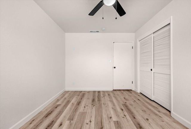 652 E Portals Ave, Fresno, CA 93710 - unfurnished bedroom with light wood-style flooring, a closet, and ceiling fan