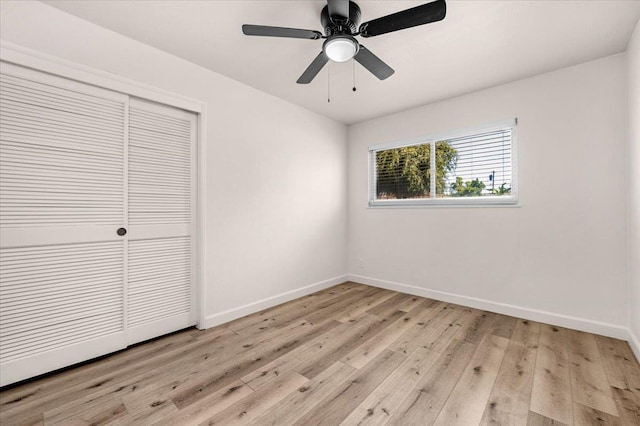 652 E Portals Ave, Fresno, CA 93710 - unfurnished bedroom featuring a closet, light wood-type flooring, and a ceiling fan