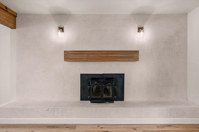 652 E Portals Ave, Fresno, CA 93710 - detailed view of wood finished floors and a fireplace