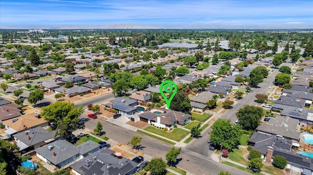 652 E Portals Ave, Fresno, CA 93710 - aerial overview of property's location featuring nearby suburban area