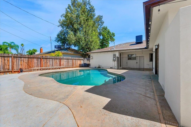 652 E Portals Ave, Fresno, CA 93710 - view of swimming pool featuring a fenced backyard and a patio