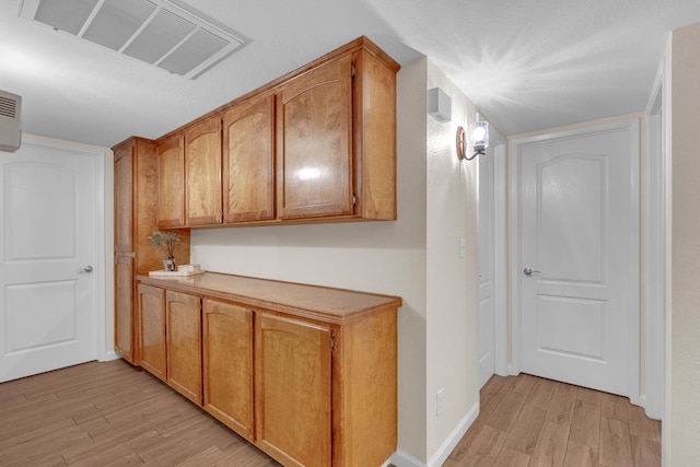 1750 E Deyoung, Fresno, CA 93720 - hall featuring light wood-style flooring and baseboards