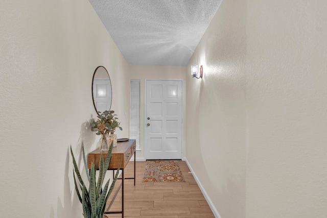 1750 E Deyoung, Fresno, CA 93720 - entryway featuring a textured ceiling and wood finish floors