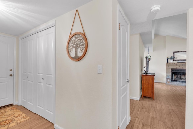 1750 E Deyoung, Fresno, CA 93720 - corridor with light wood-type flooring and lofted ceiling