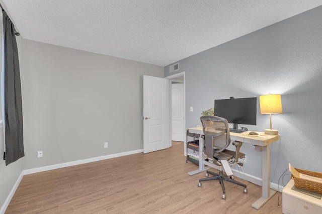 1750 E Deyoung, Fresno, CA 93720 - office with light wood finished floors and a textured ceiling