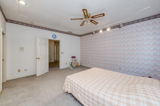 7664 N Kavanagh Ave, Fresno, CA 93711 - bedroom featuring track lighting, carpet, and a ceiling fan