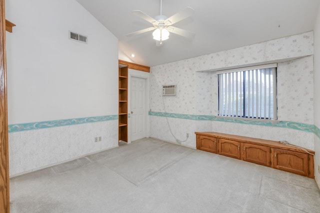 7664 N Kavanagh Ave, Fresno, CA 93711 - unfurnished room with wallpapered walls, vaulted ceiling, light colored carpet, and a ceiling fan