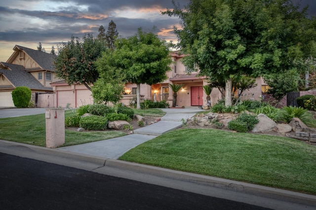7664 N Kavanagh Ave, Fresno, CA 93711 - view of property hidden behind natural elements featuring stucco siding, a front lawn, and a garage
