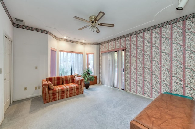 7664 N Kavanagh Ave, Fresno, CA 93711 - living area featuring a ceiling fan, carpet, and recessed lighting