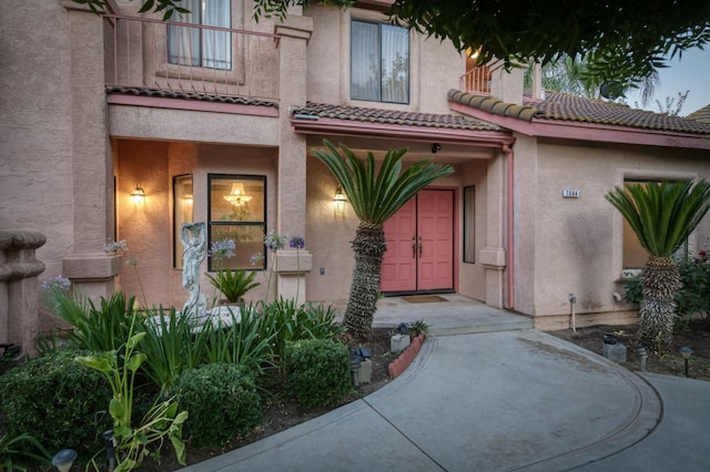 7664 N Kavanagh Ave, Fresno, CA 93711 - entrance to property with stucco siding and a tile roof