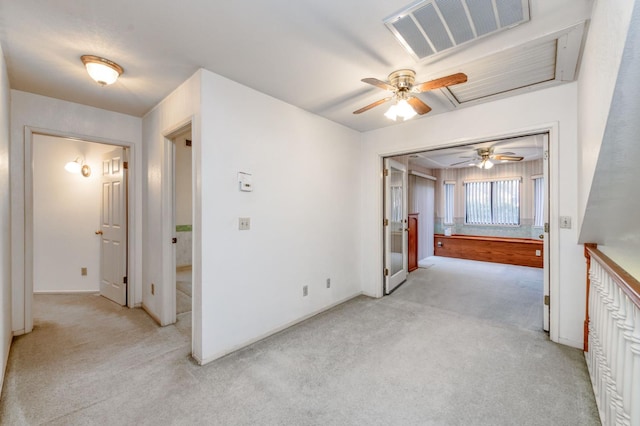 7664 N Kavanagh Ave, Fresno, CA 93711 - spare room with a ceiling fan and light colored carpet