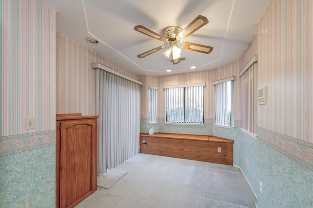 7664 N Kavanagh Ave, Fresno, CA 93711 - spare room featuring ceiling fan, wallpapered walls, and light colored carpet