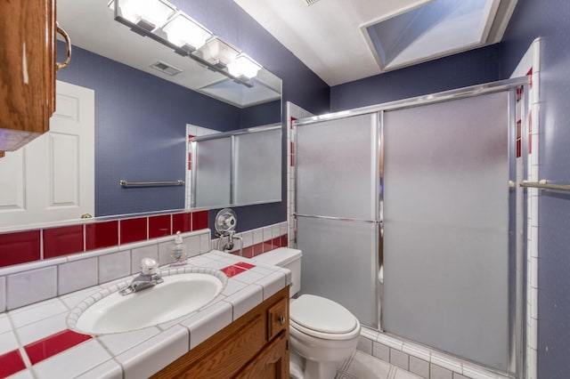 7664 N Kavanagh Ave, Fresno, CA 93711 - bathroom featuring vanity, a stall shower, and tile patterned floors