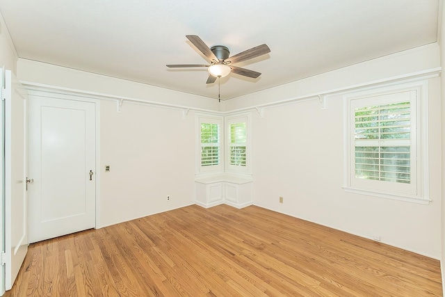 4845 Arcade Ave, Fresno, CA 93704 - spare room with light wood-style flooring, ceiling fan, and healthy amount of natural light