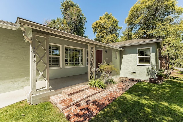 4845 Arcade Ave, Fresno, CA 93704 - single story home with a front yard, stucco siding, and a patio area