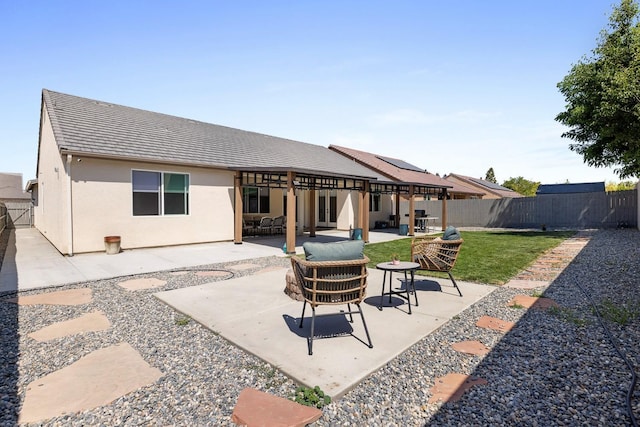 2421 N Cabrenet Pl, Hanford, CA 93230 - rear view of house featuring a fenced backyard, a patio area, and stucco siding