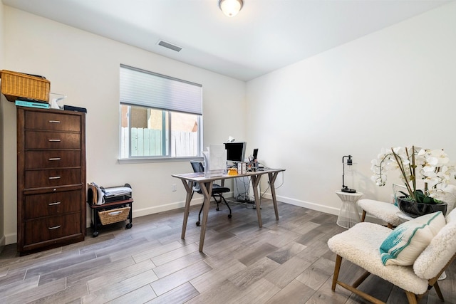 2421 N Cabrenet Pl, Hanford, CA 93230 - home office featuring light wood-type flooring and baseboards