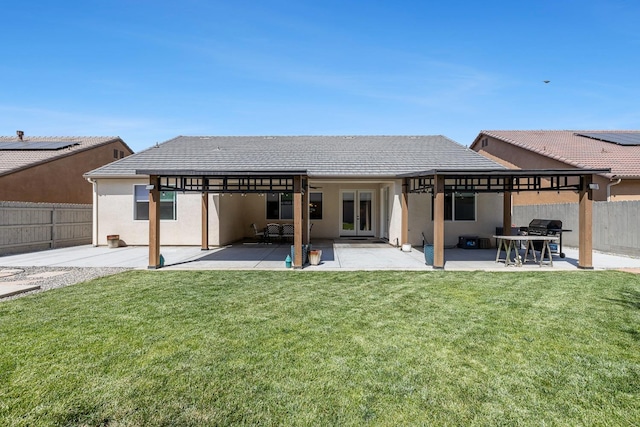 2421 N Cabrenet Pl, Hanford, CA 93230 - back of house featuring french doors, stucco siding, and a patio area