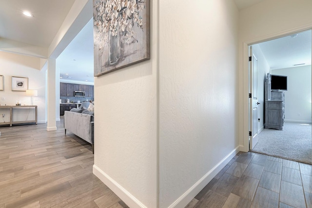 2421 N Cabrenet Pl, Hanford, CA 93230 - corridor with wood finished floors and recessed lighting