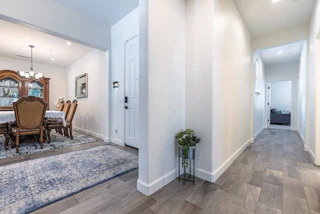 2421 N Cabrenet Pl, Hanford, CA 93230 - foyer entrance with wood finished floors, a chandelier, and recessed lighting