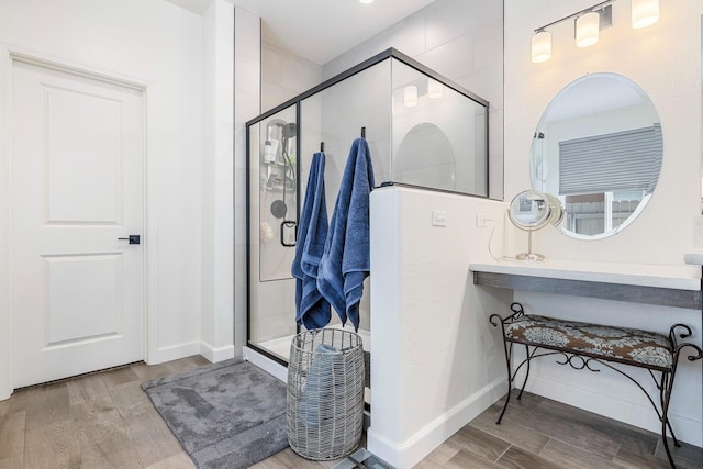 2421 N Cabrenet Pl, Hanford, CA 93230 - full bathroom featuring wood finished floors and a stall shower