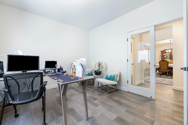 2421 N Cabrenet Pl, Hanford, CA 93230 - home office featuring a chandelier and light wood finished floors
