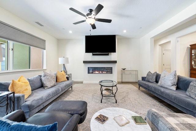 2421 N Cabrenet Pl, Hanford, CA 93230 - living area featuring a ceiling fan, recessed lighting, and a glass covered fireplace