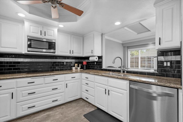 3251 W Magill Ave, Fresno, CA 93711 - kitchen featuring stainless steel appliances, ornamental molding, white cabinetry, decorative backsplash, and recessed lighting