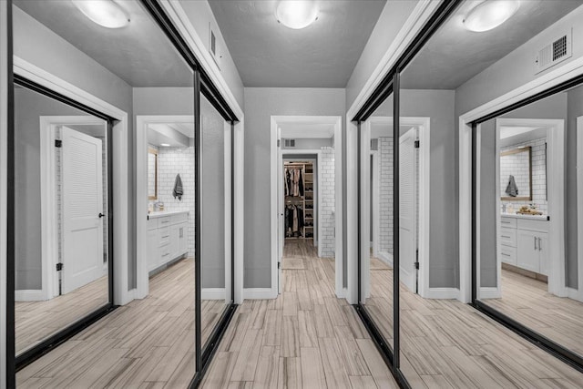 3251 W Magill Ave, Fresno, CA 93711 - corridor featuring light wood-type flooring