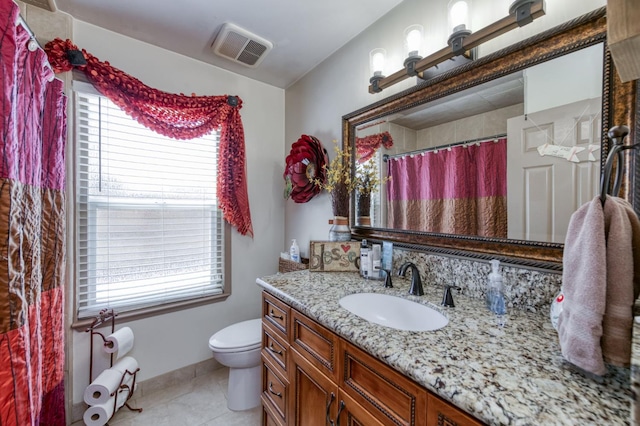 365 Stanford Ave, Clovis, CA 93611 - full bathroom with plenty of natural light, vanity, tile patterned flooring, and a shower with curtain