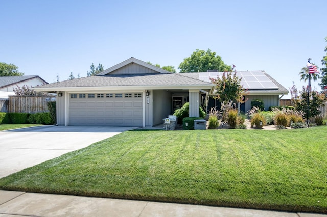 365 Stanford Ave, Clovis, CA 93611 - single story home with roof mounted solar panels, a garage, and driveway