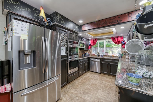 365 Stanford Ave, Clovis, CA 93611 - kitchen featuring stainless steel appliances and dark stone countertops