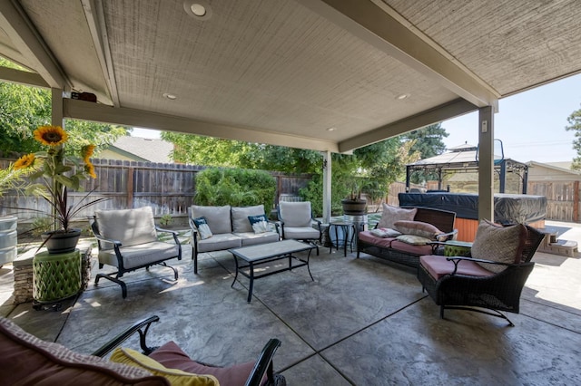 365 Stanford Ave, Clovis, CA 93611 - fenced backyard featuring a hot tub, an outdoor living space, a patio, and a gazebo