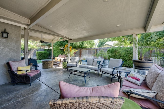 365 Stanford Ave, Clovis, CA 93611 - fenced backyard featuring an outdoor living space with a fire pit and a patio