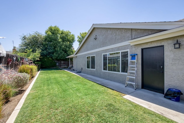 365 Stanford Ave, Clovis, CA 93611 - fenced backyard with a patio area