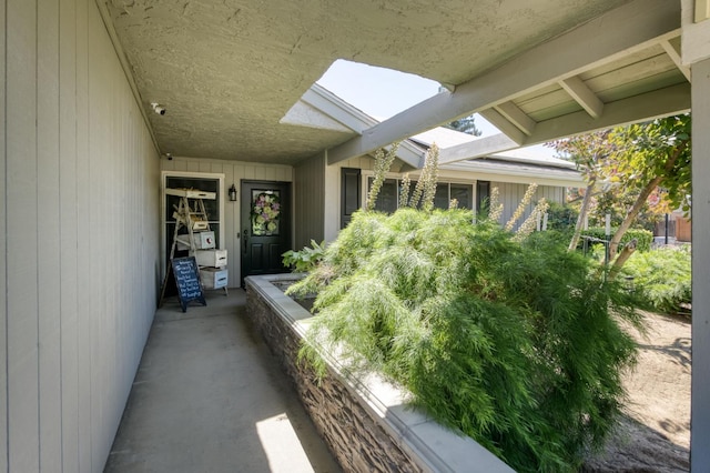 365 Stanford Ave, Clovis, CA 93611 - view of exterior entry featuring a security system