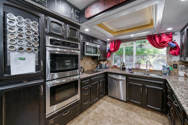 365 Stanford Ave, Clovis, CA 93611 - kitchen featuring stainless steel appliances, backsplash, stone counters, crown molding, and recessed lighting