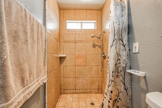 1830 Valeria St, Dos Palos, CA 93620 - full bathroom with tiled shower and a textured wall