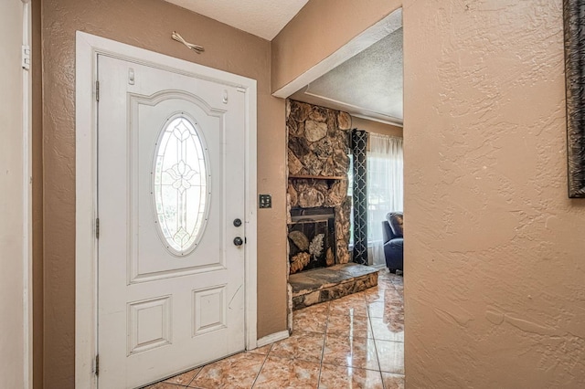1830 Valeria St, Dos Palos, CA 93620 - entryway featuring a textured wall and a textured ceiling