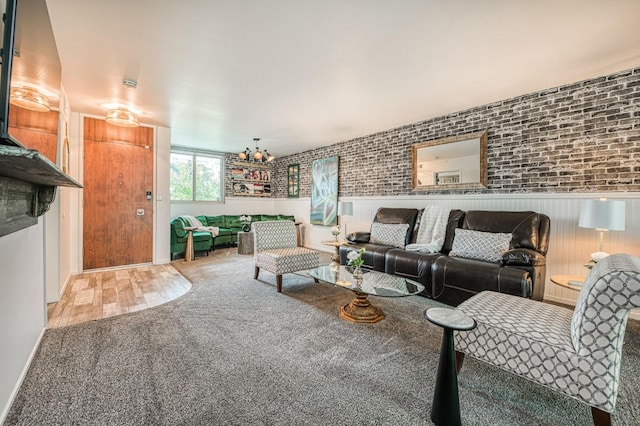 5180 N Wishon Ave Unit 103, Fresno, CA 93704 - living room with carpet floors and a chandelier