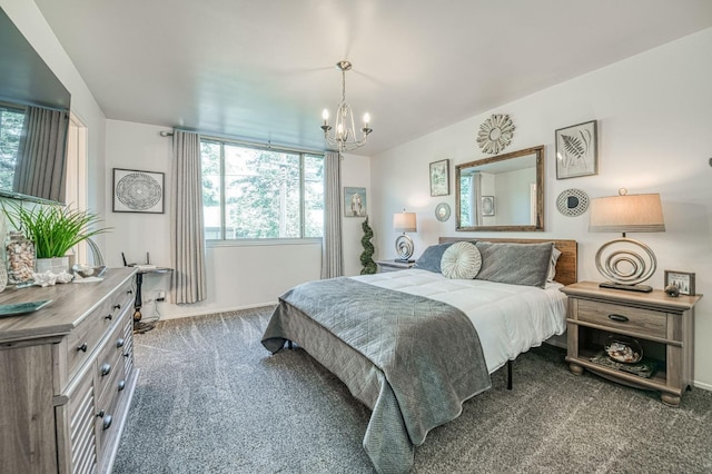 5180 N Wishon Ave Unit 103, Fresno, CA 93704 - carpeted bedroom with a chandelier and multiple windows