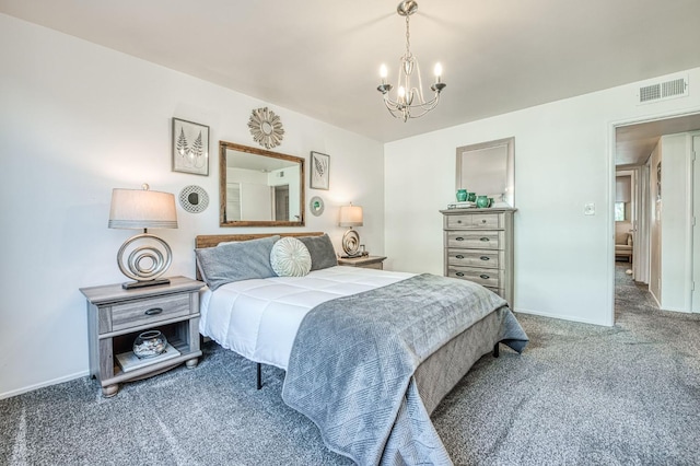 5180 N Wishon Ave Unit 103, Fresno, CA 93704 - bedroom with carpet floors and a chandelier