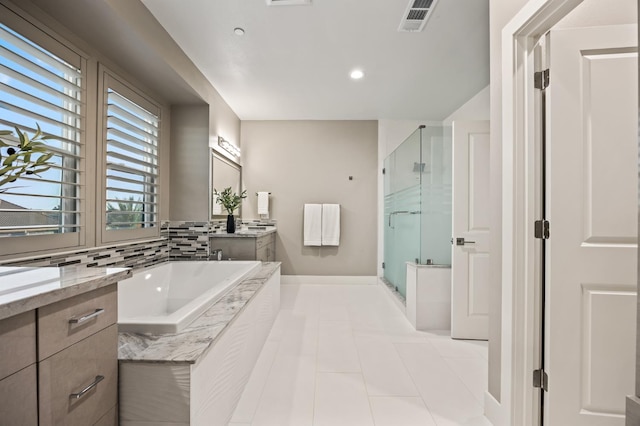 7160 W Dovewood Ln, Fresno, CA 93723 - full bath featuring a shower stall, vanity, a bath, tile patterned flooring, and recessed lighting