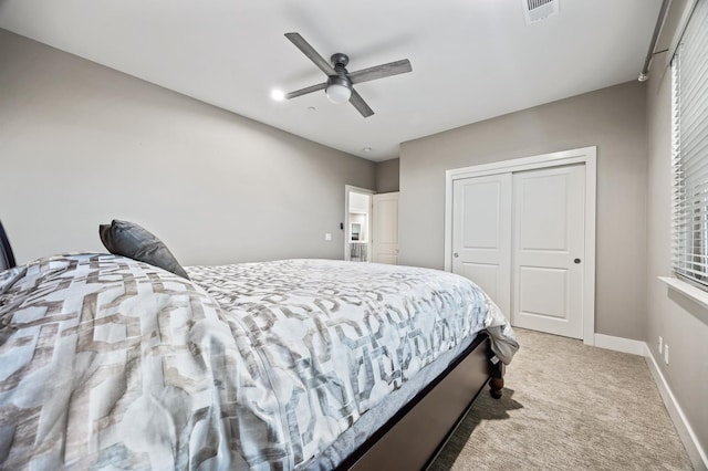 7160 W Dovewood Ln, Fresno, CA 93723 - bedroom with light carpet, a closet, a ceiling fan, and multiple windows