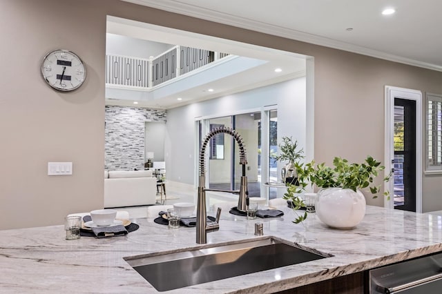 7160 W Dovewood Ln, Fresno, CA 93723 - kitchen with dishwasher, light stone counters, recessed lighting, crown molding, and open floor plan