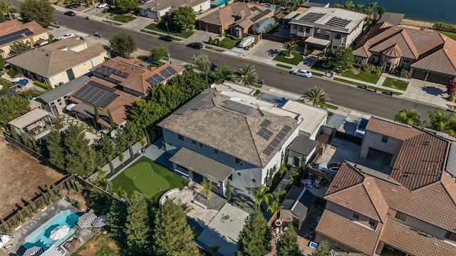 7160 W Dovewood Ln, Fresno, CA 93723 - aerial view of property and surrounding area featuring nearby suburban area and a pool area