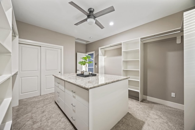 7160 W Dovewood Ln, Fresno, CA 93723 - spacious closet with light colored carpet and a ceiling fan