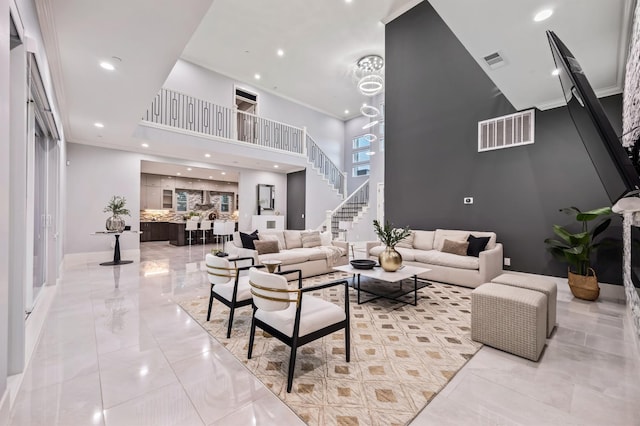 7160 W Dovewood Ln, Fresno, CA 93723 - community lobby with a high ceiling, recessed lighting, and stairway